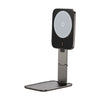 Phone stand with wireless charging pad on a white background