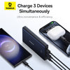 Baseus power bank charging three devices on a white background